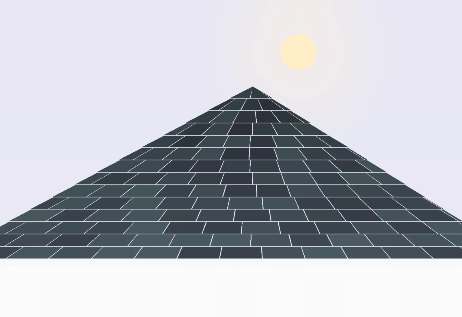 Grey shingle house with dormers among trees